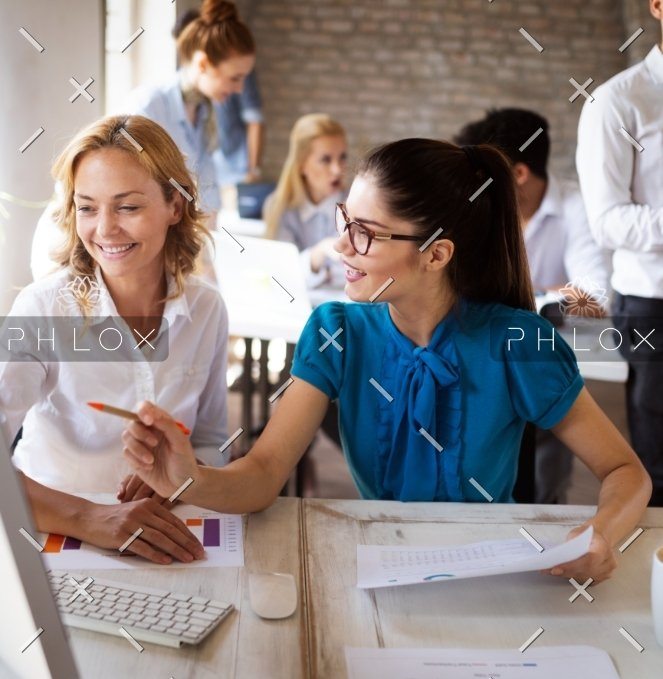 demo-attachment-469-happy-creative-team-in-office-business-startup-TUCSPHG